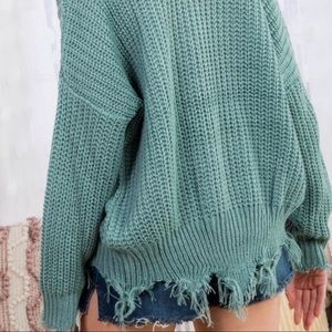 Frayed sweater